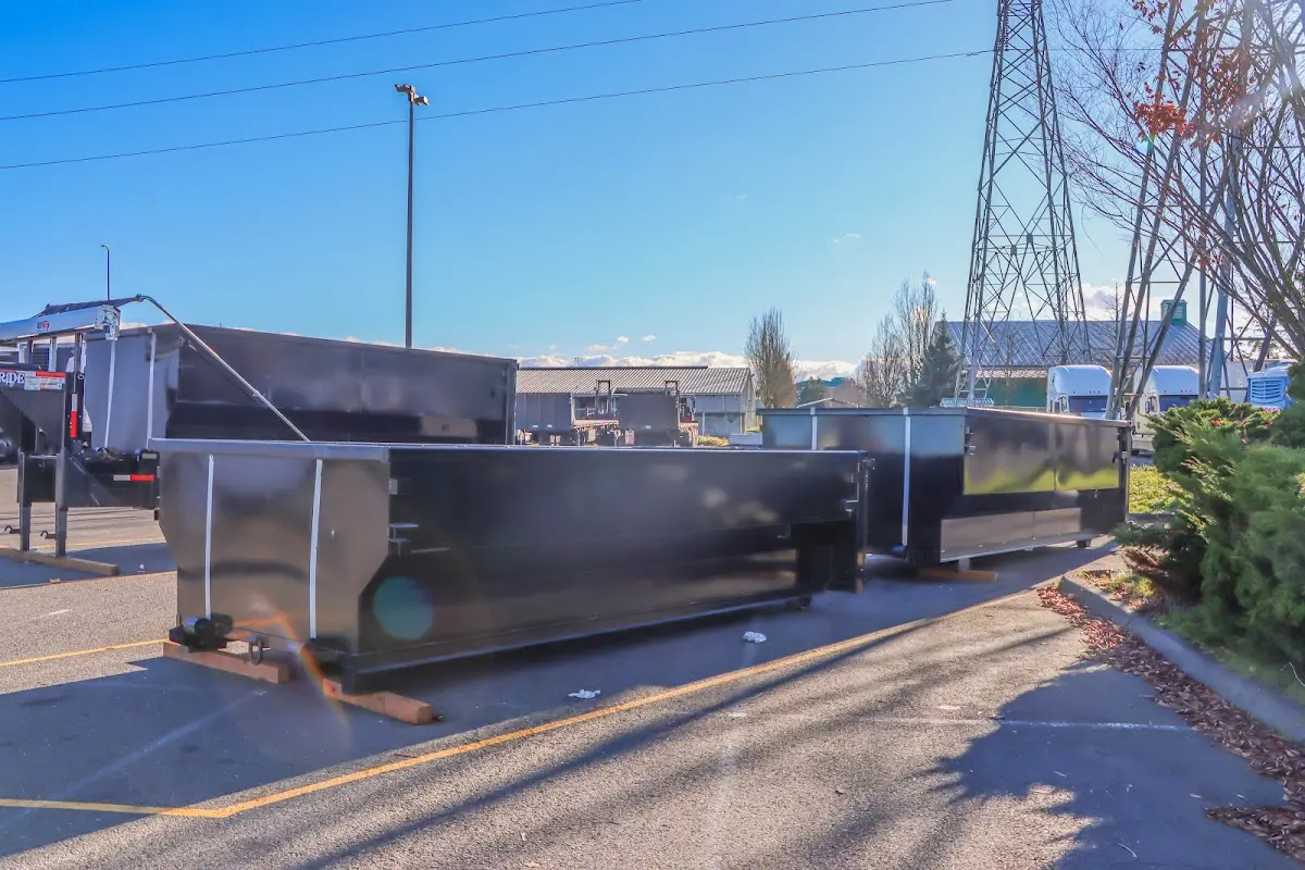 Roll-off dumpster ready for waste disposal at job site for Concrete Dumpster Rental in Vidor